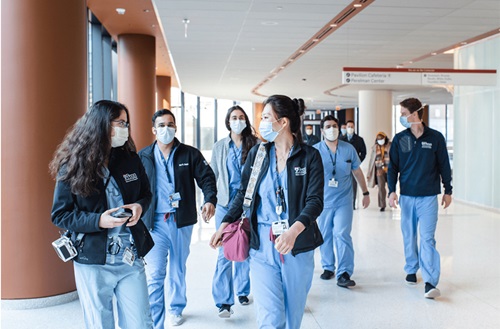 Residents walking in training complex